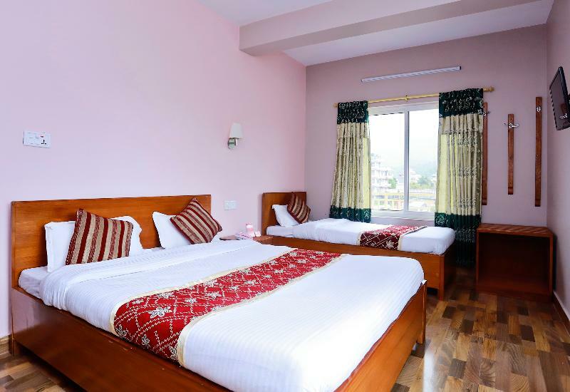 Oyo 575 Api Suites Покхара Экстерьер фото