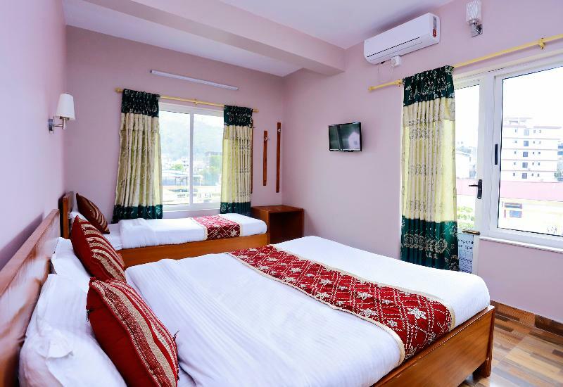 Oyo 575 Api Suites Покхара Экстерьер фото