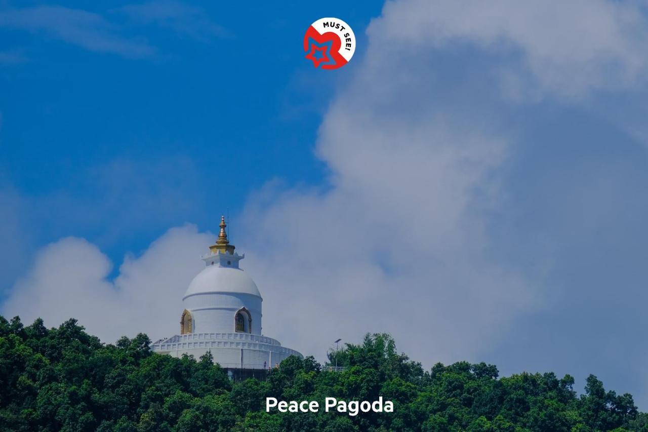 Oyo 575 Api Suites Покхара Экстерьер фото